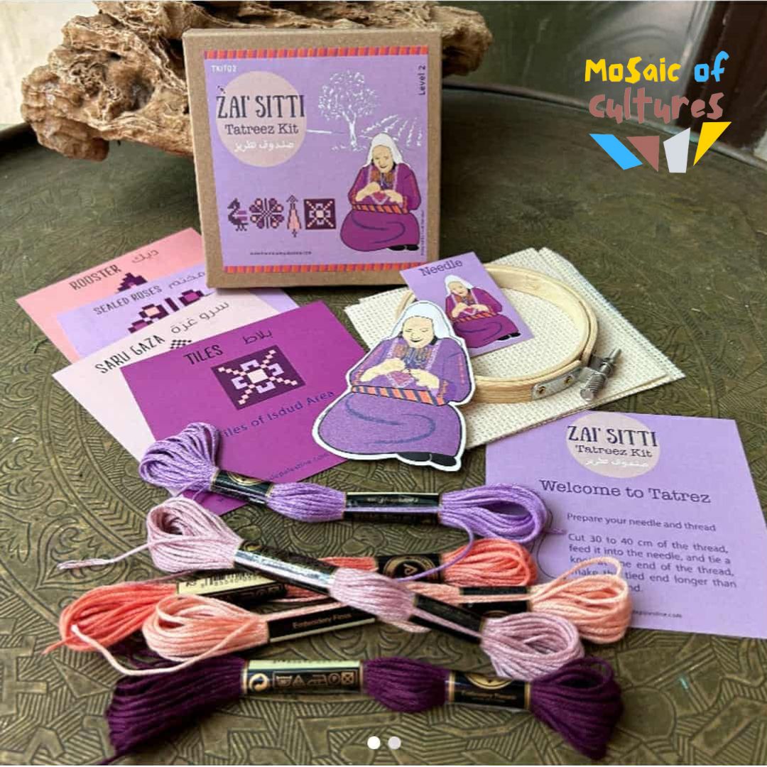 Embroidery kit with threads and instructions on a textured surface