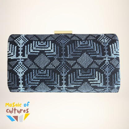 Clutch bag with Palestinian geometric pattern on a beige background, featuring the brand 'Mosaic of Cultures'.