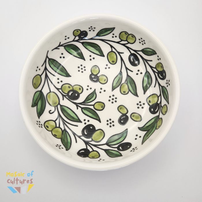 A ceramic plate with a geometric olive pattern on a white background.